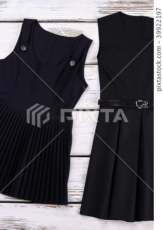 School girls classic black dresses. 39922197