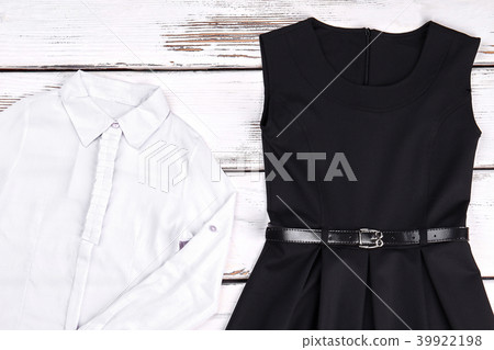Girls cotton white shirt and black dress. Girls cotton white shirt and black dress. 39922198