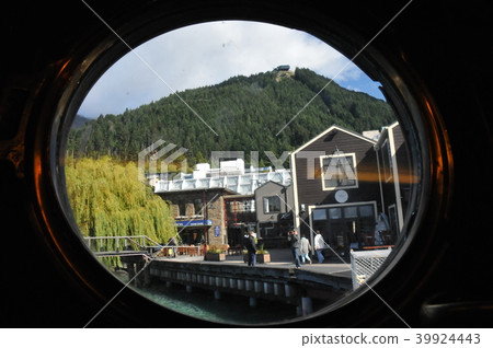 Bobs Peak from the window of Queenstown Steamship Earnslaw Bobs Peak from the window of Queenstown Steamship Earnslaw 39924443