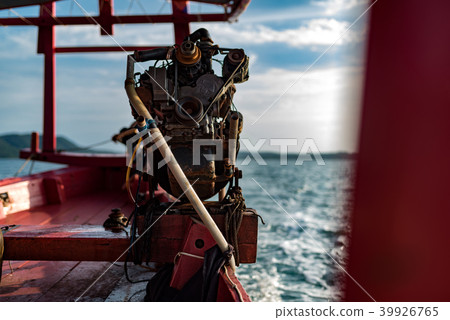 Closeup of motor engine on a Cambodian boat Closeup of motor engine on a Cambodian boat 39926765