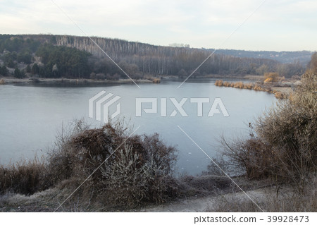 Autumn landscape on the lake. 39928473