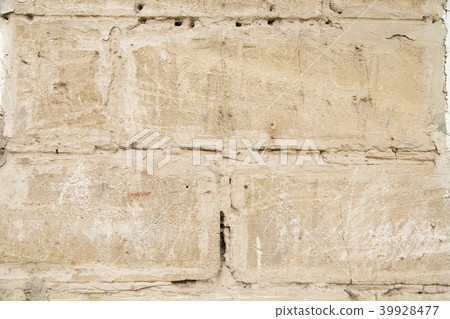 Limestone and brick facades of buildings. 39928477