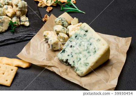 piece of French Roquefort cheese on concrete background 39930454