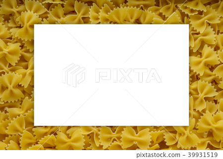 farfalle macaroni background with pasta. A view from the top, a close-up of a texture. White space farfalle macaroni background with pasta. A view from the top, a close-up of a texture. White space 39931519