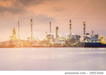 Chemical refinery water front during sunrise Chemical refinery water front during sunrise 39931688