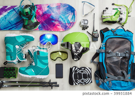 Image of snowboarder objects on wooden background. 39931884