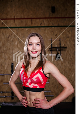 Image of slender sportswoman in sports clothes Image of slender sportswoman in sports clothes 39931891