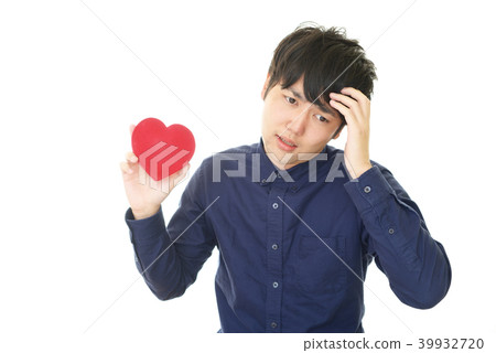 图库照片: 一个心碎的男人