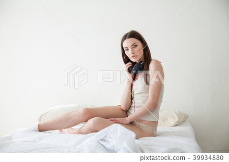 girl in lingerie woke up in the morning in the bedroom girl in lingerie woke up in the morning in the bedroom 39934880