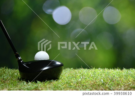 Golf ball on green grass ready to be struck Golf ball on green grass ready to be struck 39938610