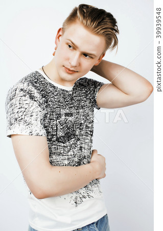 young handsome teenage hipster guy posing emotional, happy smili young handsome teenage hipster guy posing emotional, happy smili 39939548