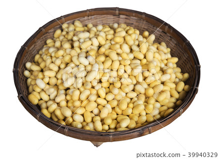Yellow cocoons in basket isolated 39940329