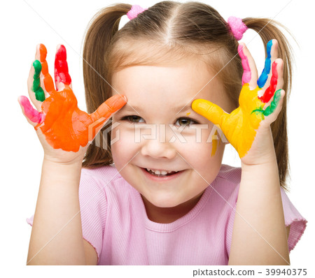 Portrait of a cute girl playing with paints Portrait of a cute girl playing with paints 39940375