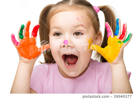 Portrait of a cute girl playing with paints Portrait of a cute girl playing with paints 39940377