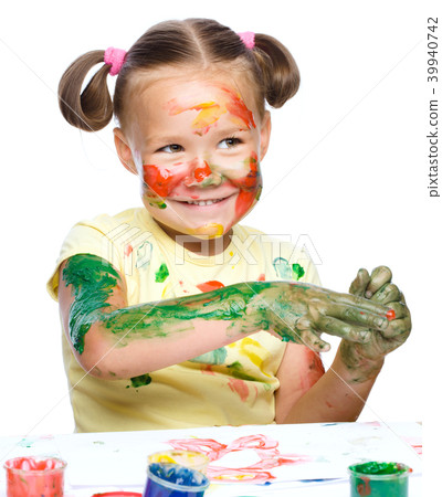 Portrait of a cute girl playing with paints Portrait of a cute girl playing with paints 39940742