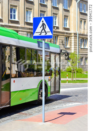 Passenger bus, sign crosswalk in Bialystok, Poland Passenger bus, sign crosswalk in Bialystok, Poland 39941772