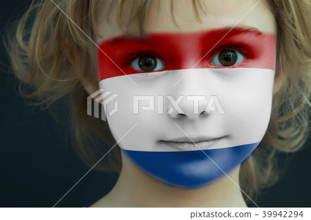 Child with a painted flag of the Netherlands 39942294
