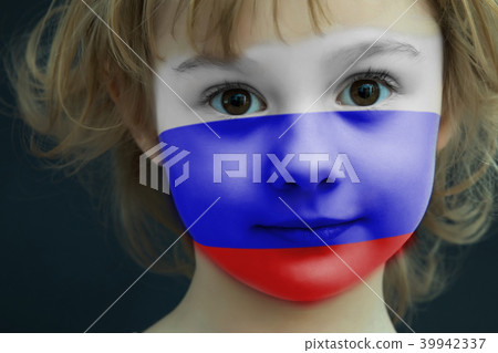 Portrait of a child with a painted Russian flag 39942337