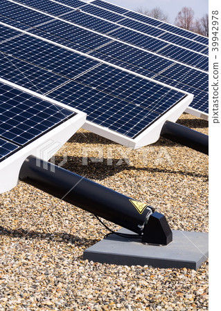 Blue rotating solar panels tilted axis tracker  39942978