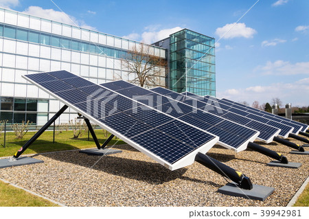 Blue rotating solar panels tilted axis tracker Blue rotating solar panels tilted axis tracker 39942981