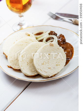 Goulash with dumplings Goulash with dumplings 39950408
