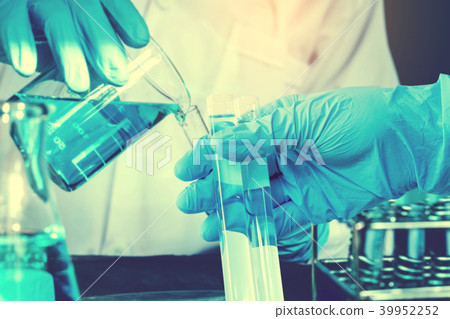 Scientist with equipment holding tools during Scientist with equipment holding tools during 39952252