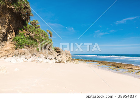 Tropical beach and rocks with ocean in Bali 39954837