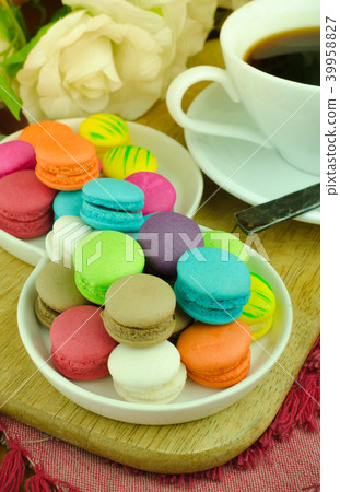 Colorful macaroons on white plate Colorful macaroons on white plate 39958827