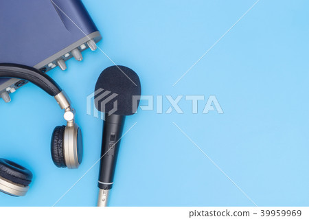 Microphone and music interface headphone on blue Microphone and music interface headphone on blue 39959969