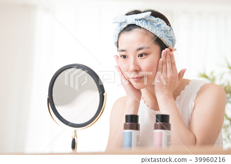 Young Japanese female beauty wearing lotion 39960216