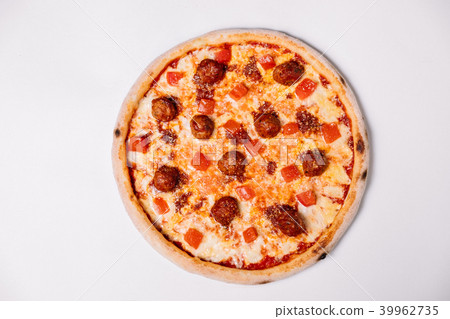 Pizza with meatballs and tomato isolated  39962735