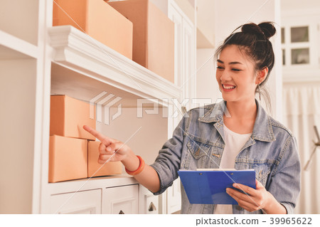 Sme business concept. Young Asian people are packing their packa 39965622