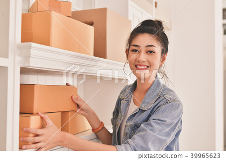 Sme business concept. Young Asian people are packing their packa 39965623