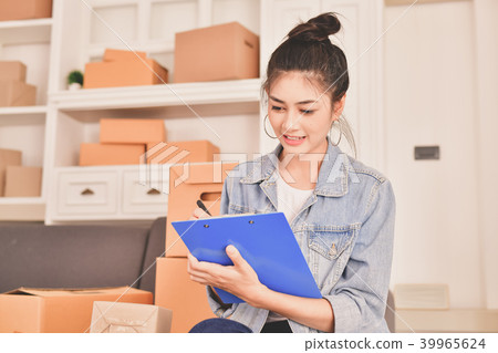 Sme business concept. Young Asian people are packing their packa 39965624