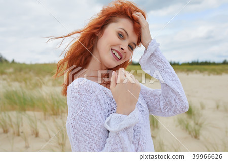 Young woman on sand to beautiful beach, Baltic Sea, Poland 39966626