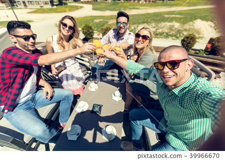 Selfie of young smiling teenagers having fun together Selfie of young smiling teenagers having fun together 39966670
