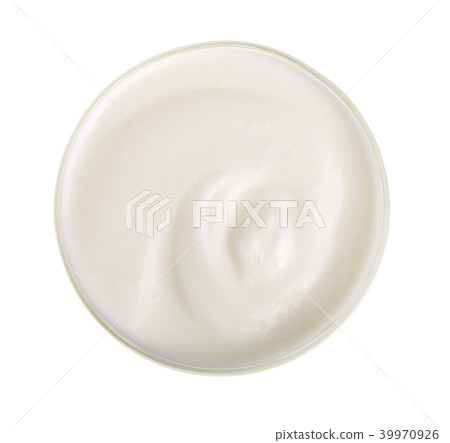 yogurt in a wooden bowl isolated on white background top view yogurt in a wooden bowl isolated on white background top view 39970926