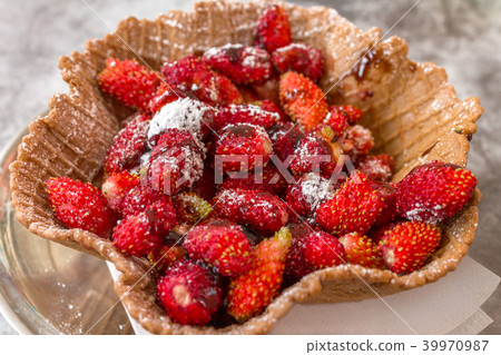 Strawberry with sugar powder in wafer 39970987