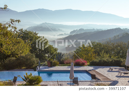 Swimming pool on the mountains and hills in Italy 39971107