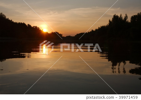 Sunset over a river 39971459