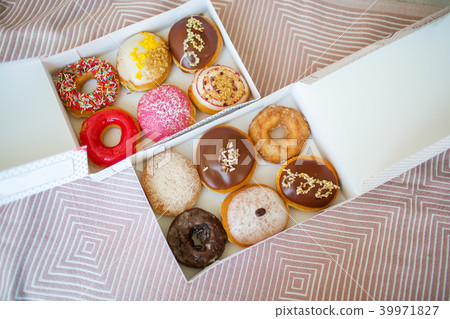 Colorful sweet donuts in box 39971827