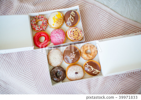 Colorful sweet donuts in box 39971833