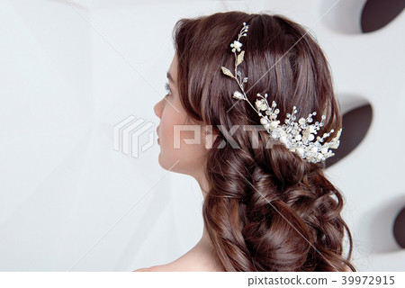 Female Elegant wedding hairstyle for the wedding, unrecognizable rear view. 39972915