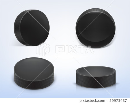 Vector set of black rubber pucks for play hockey 39973487