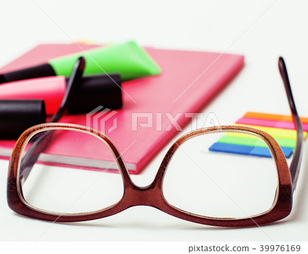 business, education and technology concept - close up of noteboo business, education and technology concept - close up of noteboo 39976169