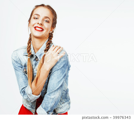 young pretty blond teenage girl emotional posing, happy smiling  39976343