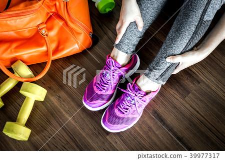 Woman with bag and fitness equipment Woman with bag and fitness equipment 39977317