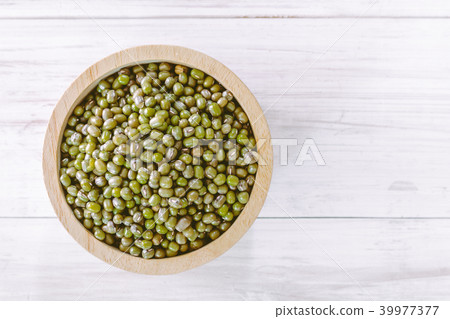 Mung bean on wooden background Mung bean on wooden background 39977377