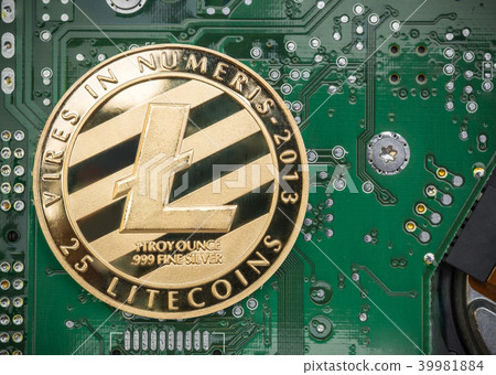 Gold metallic litecoin on electronic motherboard Gold metallic litecoin on electronic motherboard 39981884