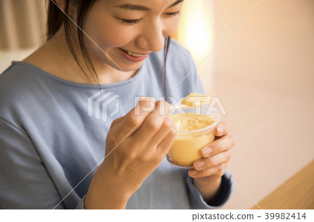 A woman enjoying sweets A woman enjoying sweets 39982414